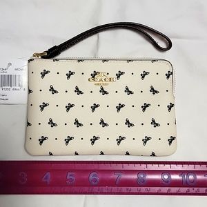 NWT Coach leather butterfly wristlet.